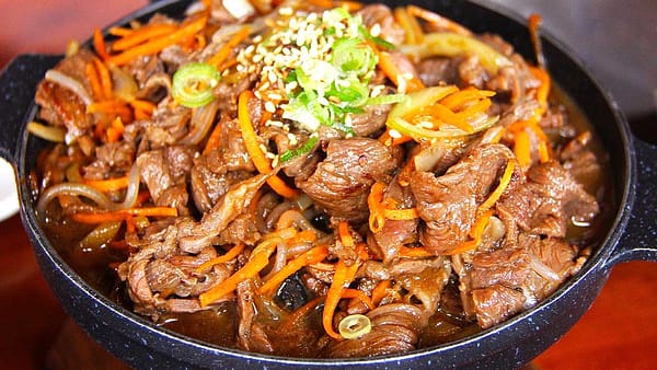 Emincé de porc et légumes au wok